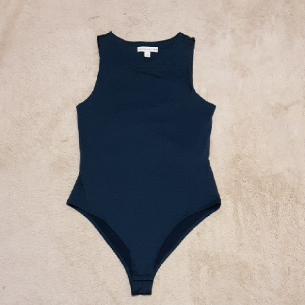 AND NOW THIS SIZE M. One Piece.